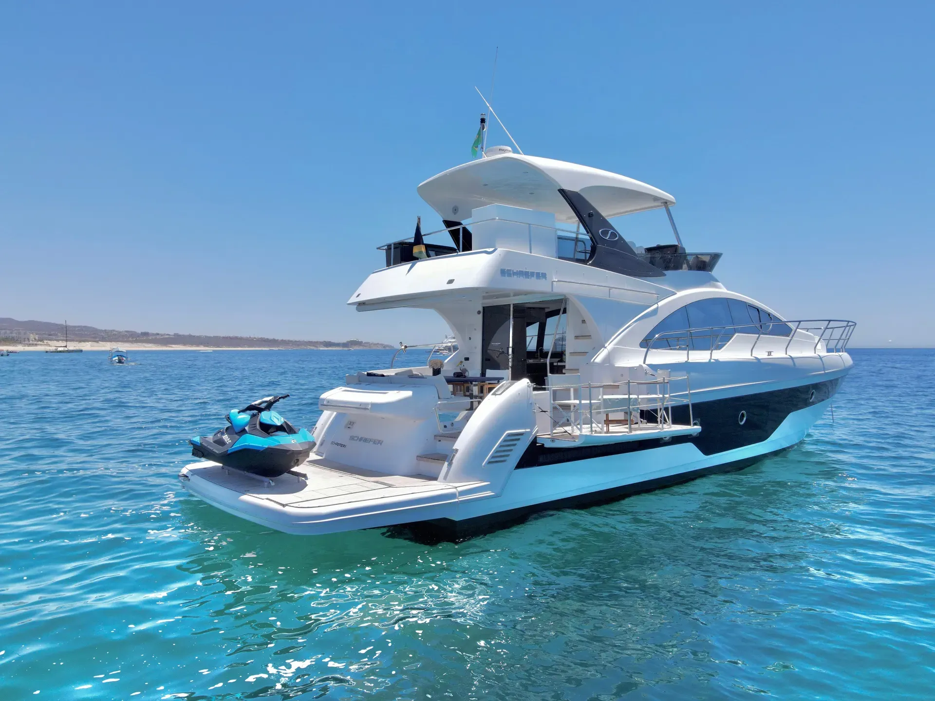 Bleed Blue anchored in turquoise water